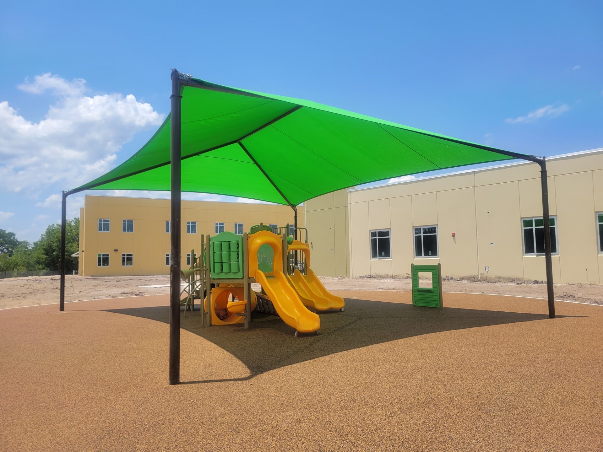 Playground with shade structure