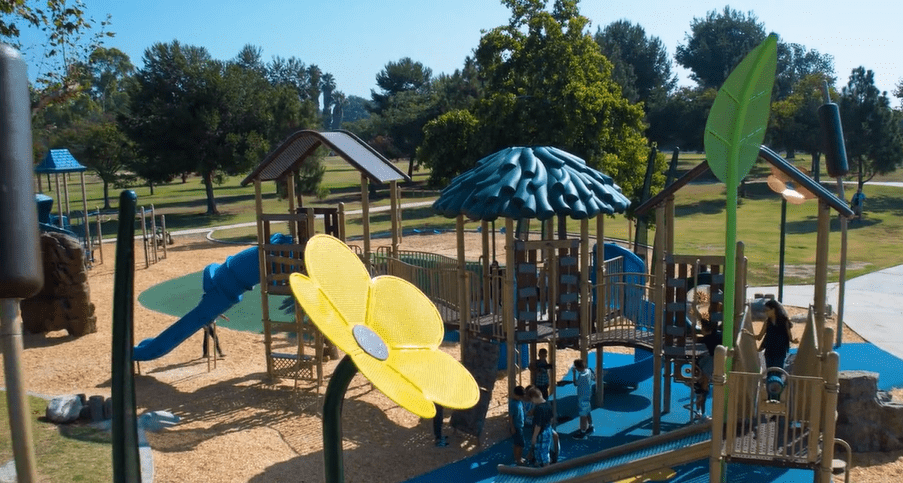 Custom playground theme with leaf and flower structures.